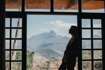 Woman looking out at mountains